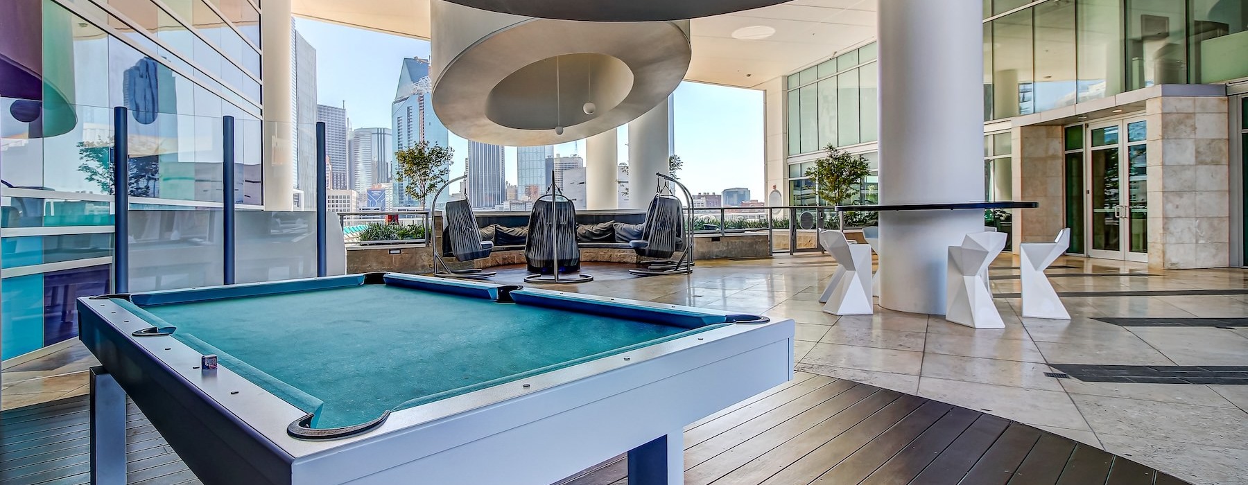a clubroom with a pool table