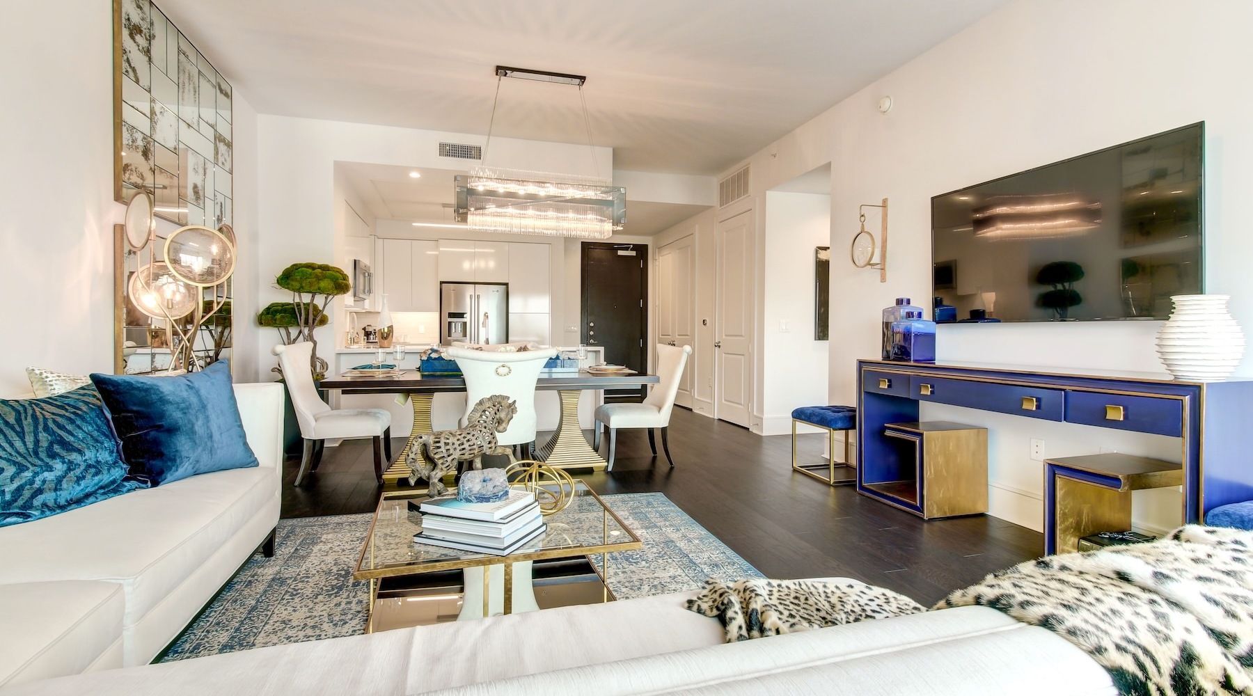 a living room with a couch and a tv